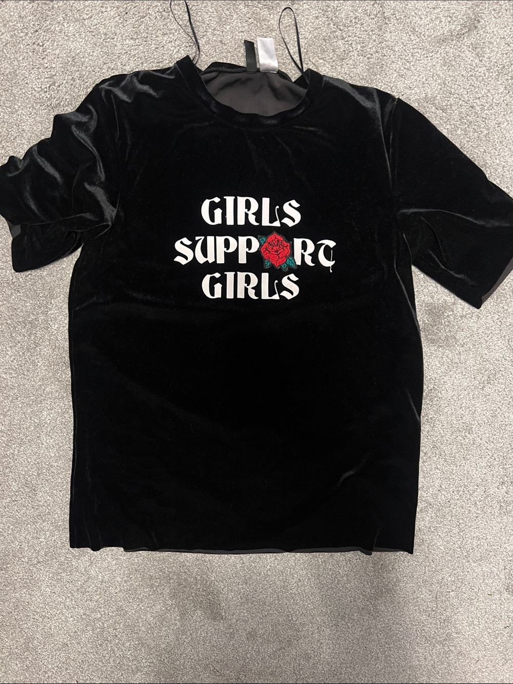 Divided Black Velvet Tee with 'Girls Support Girls' Rose Graphic